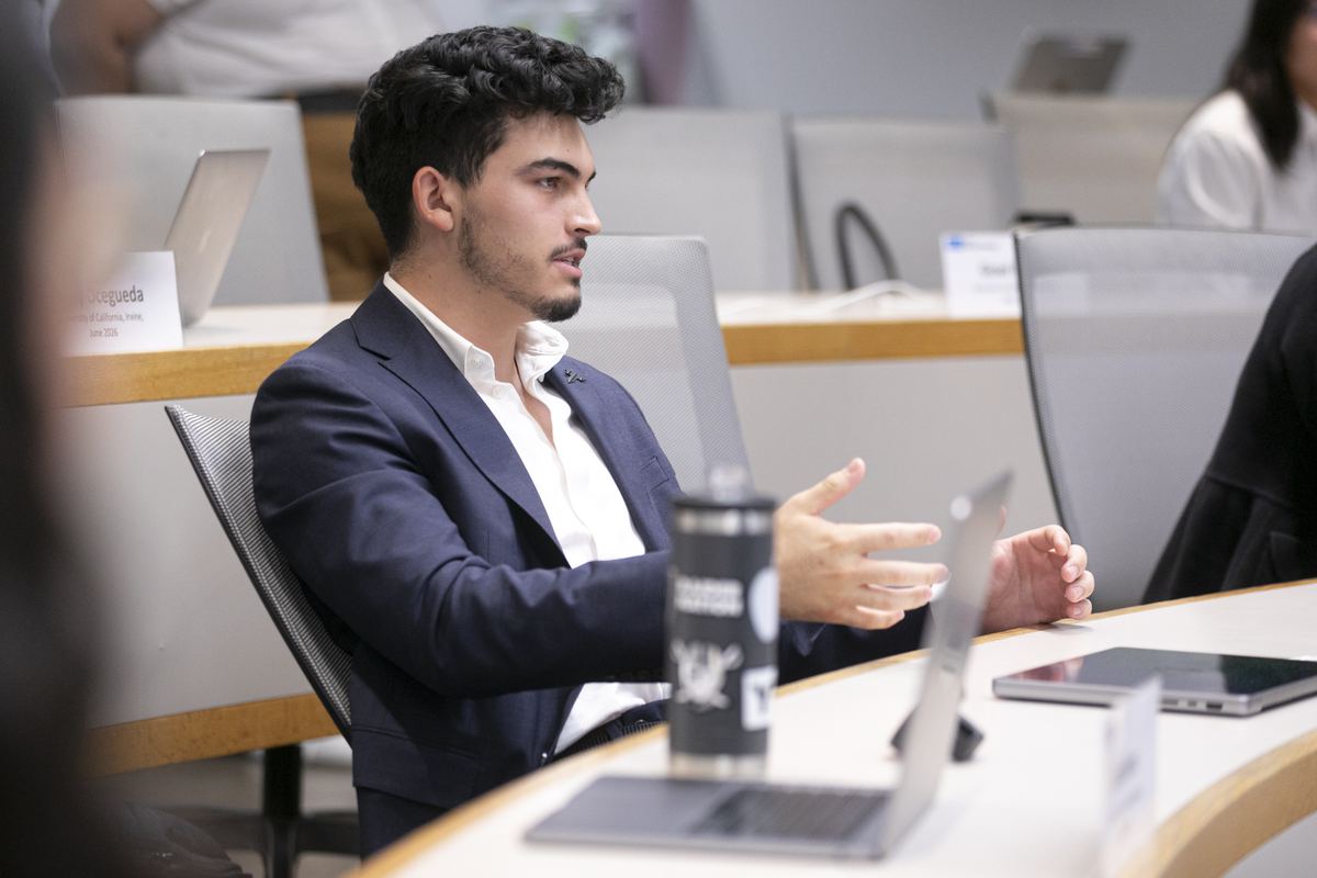 Connor Ruffalo speaking during a lecture conference